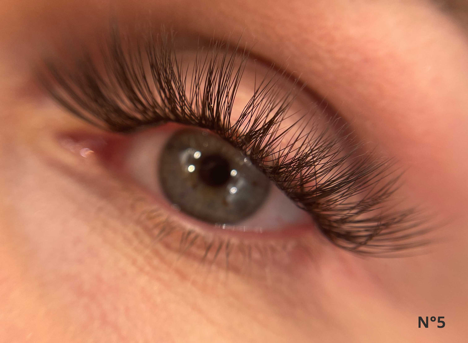 Cat-eye lash extensions ranging from natural to dramatic.  GirlGotLashes